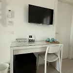 Eleven & Habitación en casa particular Olbia