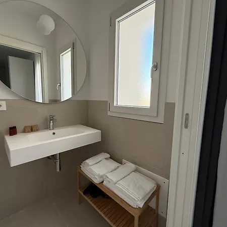 Eleven & Habitación en casa particular Olbia