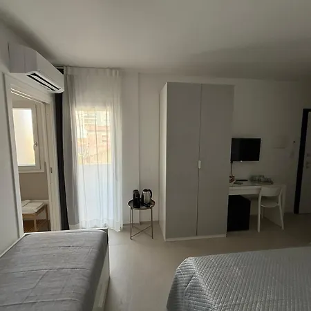 Eleven & Habitación en casa particular Olbia